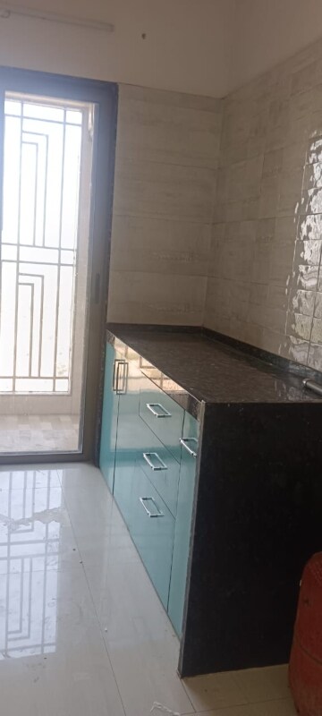 Kitchen in 1 BHK Apartment at Regency Anantam, Dombivli East – for Rent