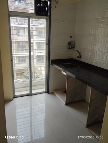 Kitchen in 1 BHK Apartment at Manoj Mahavir Tower, Ulwe – for Sale