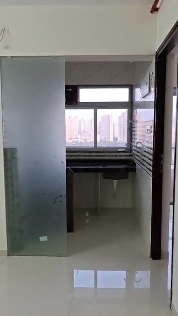 Kitchen in 1 BHK Apartment at JVM Aroma, Kasarvadavali – for Rent