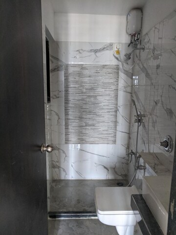 Bathroom in 2 BHK Apartment at Hubtown Hill Crest, Andheri East – for Rent
