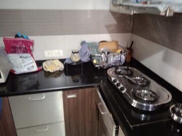 Kitchen in 2 BHK Apartment at Satyam Grande, Vashi Sector 9 – for Rent