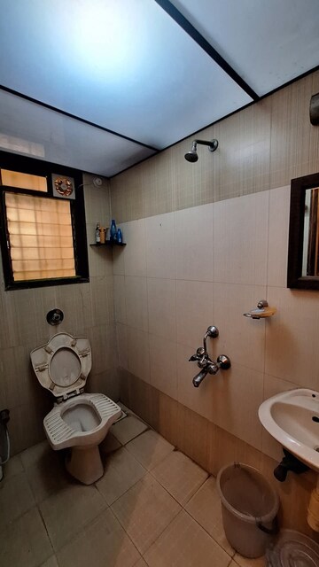 Bathroom in 2 BHK Apartment at Suyog CHS Goregaon West, Goregaon West – for Rent