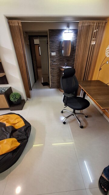 Living Room in 2 BHK Apartment at Suyog CHS Goregaon West, Goregaon West – for Rent