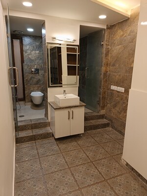 Bathroom in 3.5 BHK Builder Floor at Saraswati Vihar – for Sale