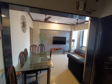 Living Room in 1 BHK Apartment at Khar West – for Rent