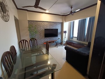 Living Room in 1 BHK Apartment at Khar West – for Rent