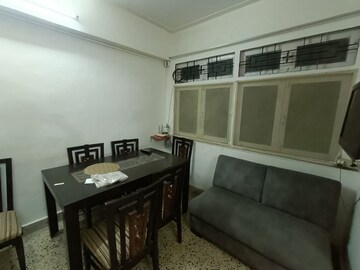 Living Room in 1.5 BHK Apartment at Santacruz West – for Rent