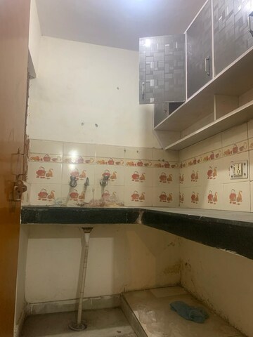 Kitchen in 2 BHK Apartment at RWA Qutab Enclave, Katwaria Sarai – for Rent