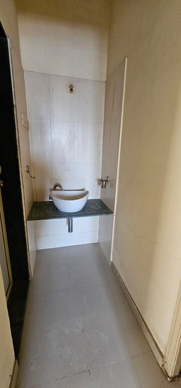 Bathroom in 2 BHK Apartment at Puranik City, Kasarvadavali – for Sale