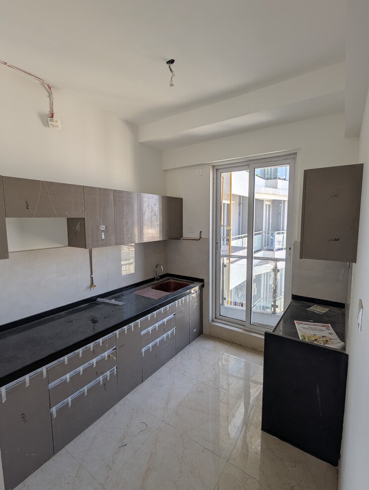 Kitchen, rosa-manhattan 2 Bedroom 754 Sq.Ft. Apartment In Ghodbunder Road Thane 8549462