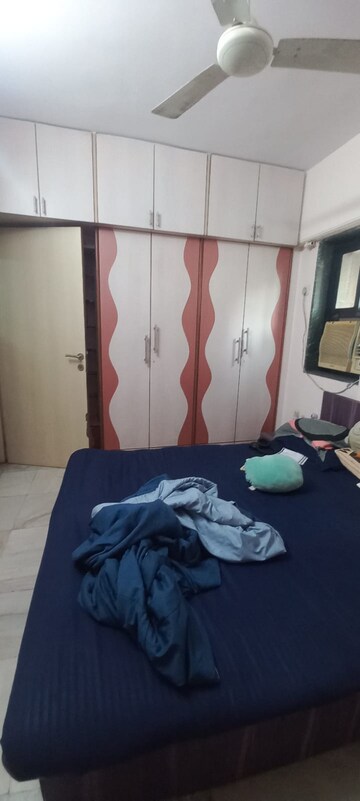 Bedroom in 2 BHK Apartment at Satellite Garden, Goregaon East – for Rent