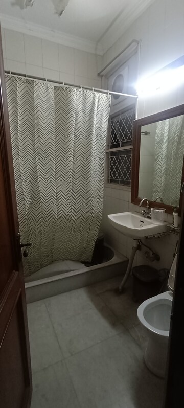 Bathroom in 3.5 BHK Builder Floor at Pamposh Enclave – for Rent