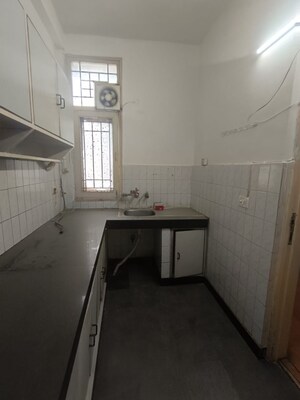 Kitchen in 2.5 BHK Builder Floor at Green Park – for Sale