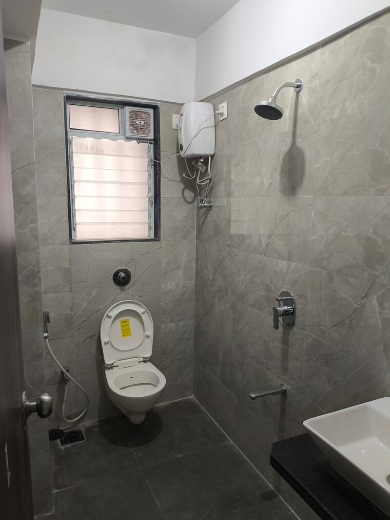 Bathroom, vision-heeraji 2 Bedroom 630 Sq.Ft. Apartment In Parekh Nagar Mumbai 8549826