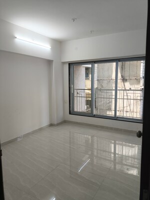 Room in 2 BHK Apartment at Vision Heeraji, Parekh Nagar – for Sale