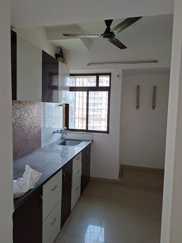 Kitchen in 1 BHK Apartment at Puranik Hometown, Ghodbunder Road – for Rent