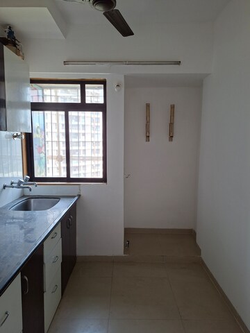 Kitchen in 1 BHK Apartment at Puranik Hometown, Ghodbunder Road – for Rent