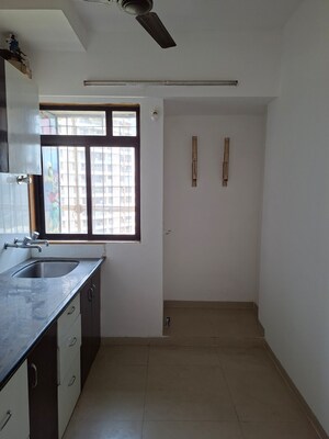 Kitchen in 1 BHK Apartment at Puranik Hometown Phase II, Ghodbunder Road – for Sale