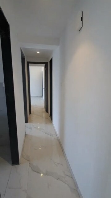 Building Lobby in 2 BHK Apartment at Dev Leo Tower, Oshiwara – for Rent