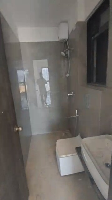Bathroom in 2 BHK Apartment at Dev Leo Tower, Oshiwara – for Rent