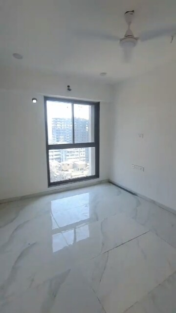 Room in 2 BHK Apartment at Dev Leo Tower, Oshiwara – for Rent