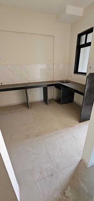 Kitchen in 1 BHK Apartment at Pushpanjali Heights, Owale – for Sale
