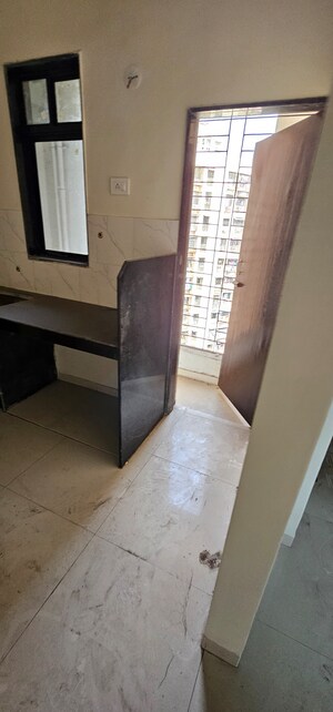 Kitchen in 1 BHK Apartment at Pushpanjali Heights, Owale – for Sale