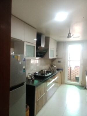 Kitchen in 4 BHK Apartment at Raja Park – for Sale