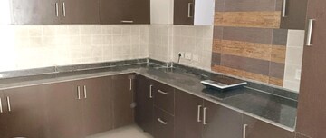Kitchen in 4 BHK Apartment at Amrapali Platinum, Sector 119 – for Sale
