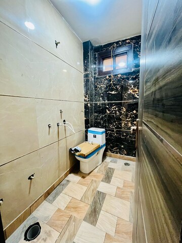 Bathroom in 2 BHK Builder Floor at Dwarka Mor – for Sale