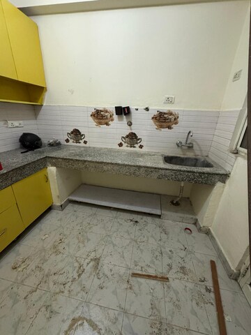 Kitchen in 2 BHK Apartment at Nitishree Aura Chimera, Raj Nagar Extension – for Rent
