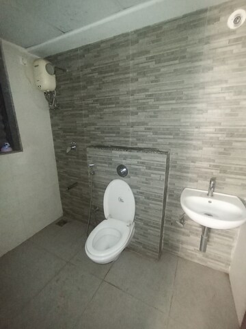 Bathroom in 1.5 BHK Apartment at Lodha Palava City Lakeshore Greens, Dombivli East – for Sale