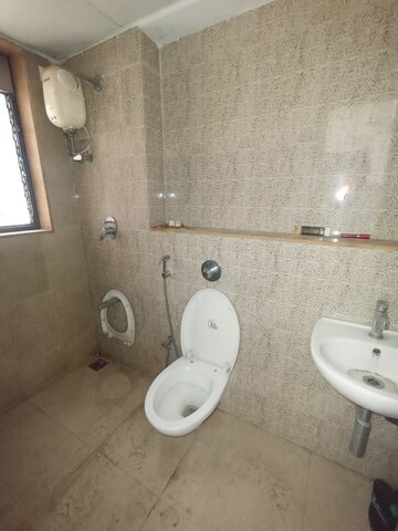 Bathroom in 1.5 BHK Apartment at Lodha Palava City Lakeshore Greens, Dombivli East – for Sale