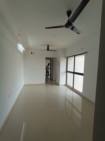 Living Room in 1 BHK Apartment at Lodha Palava Downtown, Dombivli East – for Sale
