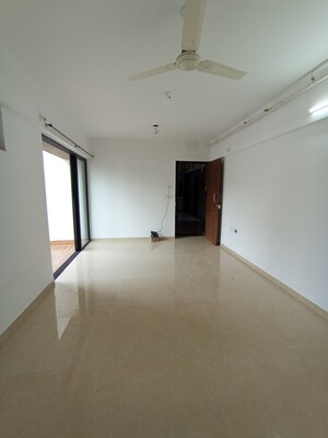 Living Room in 2 BHK Apartment at Lodha Palava Downtown, Dombivli East – for Sale