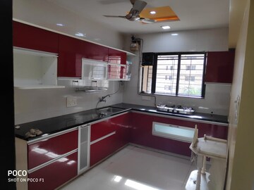 Kitchen in 3 BHK Apartment at Madhavbaug Society, Bhusari Colony – for Rent