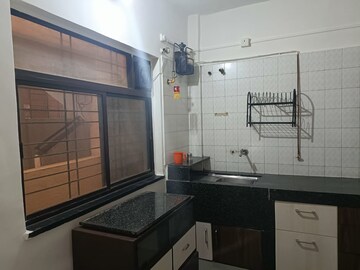 Kitchen in 2 BHK Apartment at Sarvantika Apartment, Bhusari Colony – for Rent