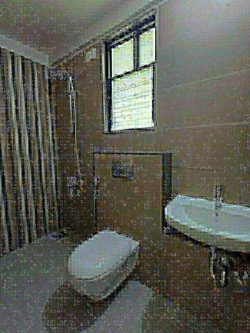 Bathroom in 2.5 BHK Apartment at Magarpatta Riverview City Hornbill Heights, Loni Kalbhor – for Sale