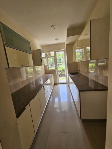 Kitchen in 3 BHK Apartment at ATS Triumph, Sector 104 – for Rent