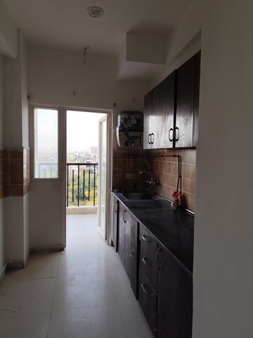 Kitchen in 2.5 BHK Apartment at Aims Golf Avenue II, Sector 75 – for Rent
