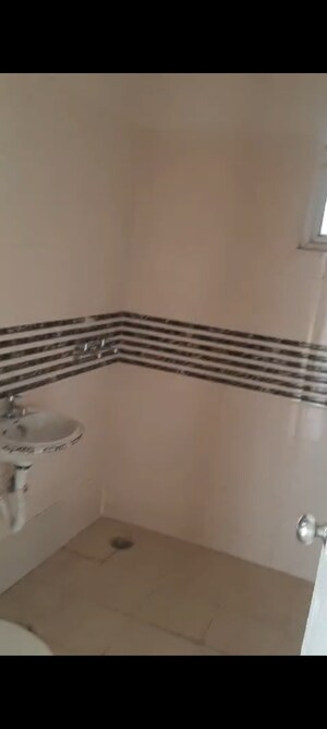 Bathroom in 2 BHK Apartment at Shree Vardhman Green Court, Sector 90 – for Sale
