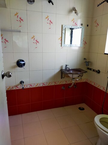 Bathroom in 3 BHK Apartment at Sanskruti Prabhat, Prabhat Road – for Rent