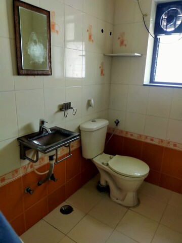 Bathroom in 3 BHK Apartment at Sanskruti Prabhat, Prabhat Road – for Rent