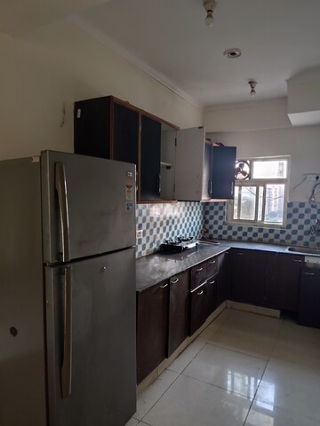 Kitchen in 3 BHK Apartment at Aims Golf Avenue II, Sector 75 – for Rent