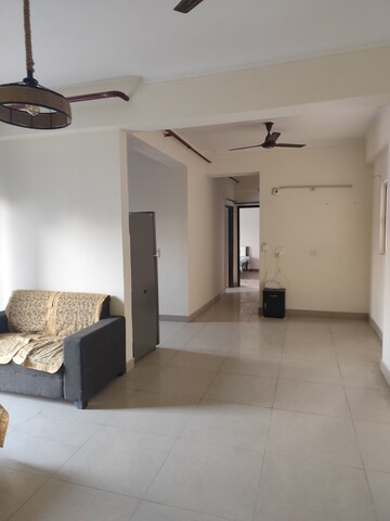 Living Room in 3 BHK Apartment at Aims Golf Avenue II, Sector 75 – for Rent