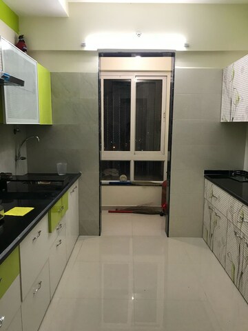 Kitchen in 3.5 BHK Apartment at Harmony Sky Suites, Ghodbunder Road – for Rent