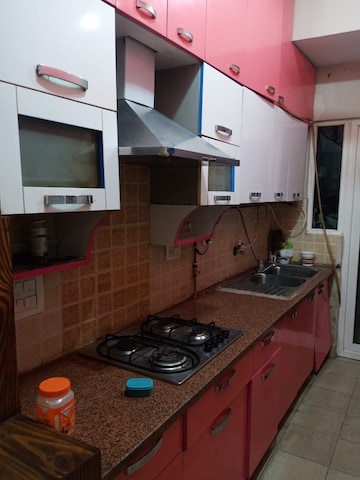 Kitchen in 3 BHK Apartment at Mahagun Moderne, Sector 78 – for Sale