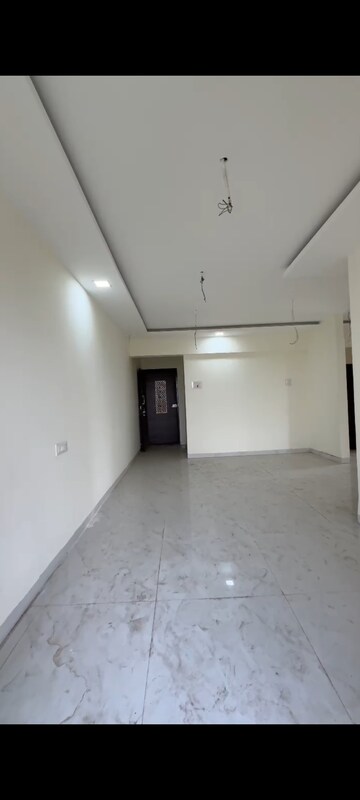 Living Room in 2 BHK Apartment at Umiya Nakshatra, Katrap – for Rent