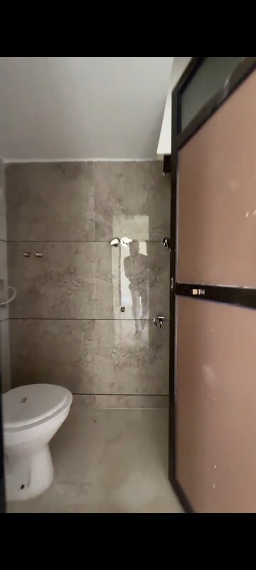 Bathroom in 2 BHK Apartment at Umiya Nakshatra, Katrap – for Rent