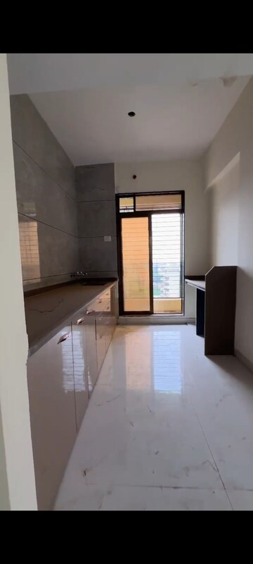 Kitchen in 2 BHK Apartment at Umiya Nakshatra, Katrap – for Rent